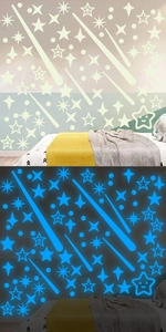 Luminous wall stickers showing daylight off-white and blue night glow effect in bedroom