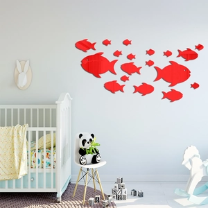 Detailed view of red mirror-finish fish wall decals set for creative room decoration