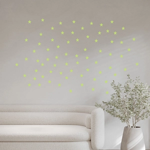 Luminous star wall stickers in light green for glowing starry ceiling in a kids bedroom