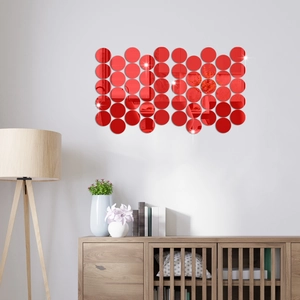 Macro shot of red round mirror wall stickers in a modern minimalist living room setting