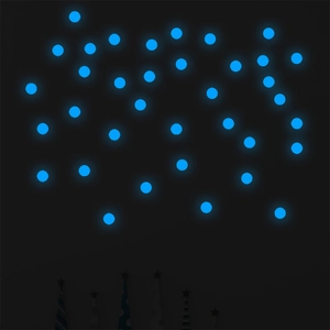 Macro shot of glow in the dark blue luminous dot wall stickers for home decoration