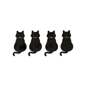Detail of four black matte cat-shaped wall stickers with subtle floral pattern
