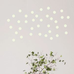 Luminous geometric dot wall stickers for home decor glowing in the dark blue light