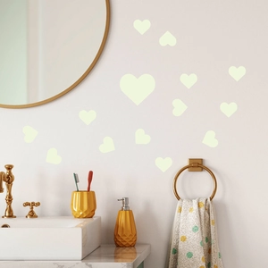 Luminous heart-shaped wall stickers for bedroom home decor in warm bathroom setting