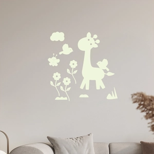 Glow-in-the-dark wall stickers with cartoon giraffe and birds in a modern living room