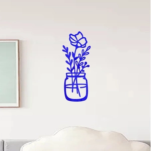 Close-up of blue acrylic floral vase silhouette wall sticker on a clean white background