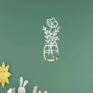 Close-up of modern 3D acrylic mirror wall sticker featuring minimalist floral design