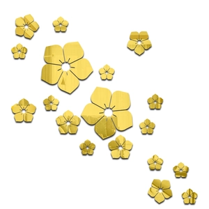 Détail macro de stickers muraux fleurs 3D en acrylique doré avec effet miroir brillant