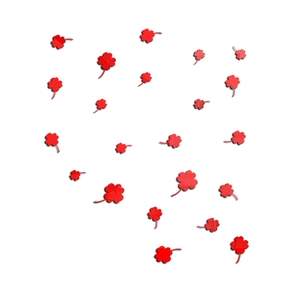 Detail of red acrylic 3D clover wall stickers showing thickness and glossy finish