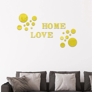 Detailed view of yellow 3D acrylic mirror wall stickers with HOME and LOVE lettering