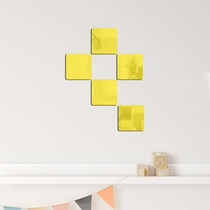 Detailed view of 5-piece bright yellow square acrylic mirror wall stickers on a white wall