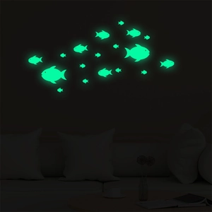 Luminous fish wall stickers glowing in the dark for a dreamy children's room decor