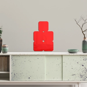 Detail of red square acrylic mirror wall stickers showing clear reflection on living room wall
