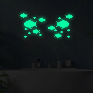 Glow in the dark fish wall stickers set for bathroom decoration in neon green light
