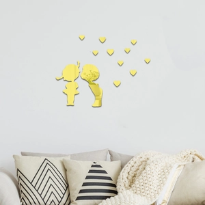 Detailed close-up of golden mirror acrylic wall stickers featuring kids and hearts decor