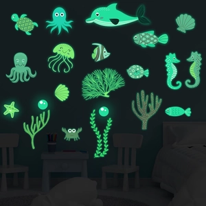 Luminous marine animal wall stickers glowing in a dark children room with sea creatures