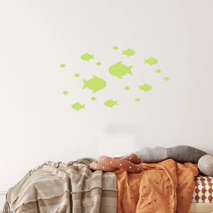 Luminous fish wall stickers for kids bedroom featuring glow in the dark ocean silhouettes