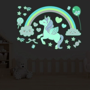 Luminous unicorn and rainbow wall stickers set glowing in a dark kids room decor