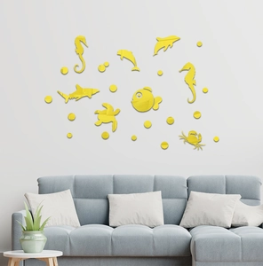Detailed arrangement of yellow acrylic sea animal mirror wall stickers on white living room wall