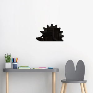 Detail of dark acrylic hedgehog mirror wall sticker reflecting indoor room light and decor