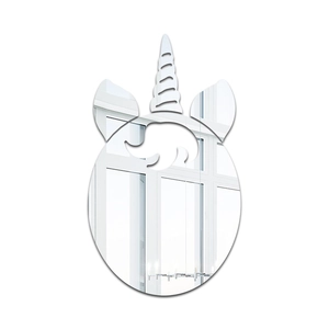 Detail view of silver acrylic mirror wall decal showing 3D unicorn head and horn pieces