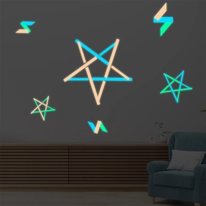 DIY luminous wall strips in blue and green creating star patterns on a dark gray wall