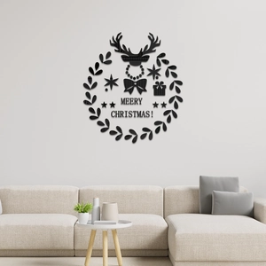 Détail du sticker mural de Noël en acrylique noir avec cerf et texte Merry Christmas sur le mur