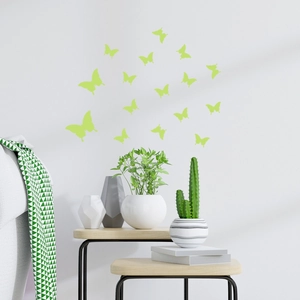 Luminous butterfly wall stickers in a modern room with Nordic plants and wooden decor