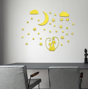 Modern acrylic cat wall stickers featuring yellow mirror moon and stars on a white wall