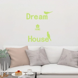 Luminous wall stickers featuring Dream Home quotes and birds above a modern white sofa
