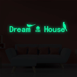 Luminous glow-in-the-dark Dream House wall stickers with birds in dark room interior