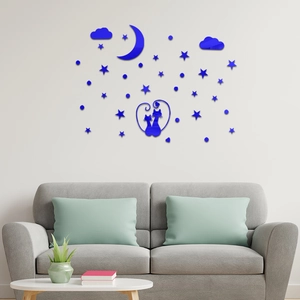 Blue acrylic mirror wall stickers with cats, moon and stars above a sofa for home decor