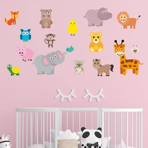 Cartoon animal world wall stickers with 3D eyelash decor in a pink nursery setting