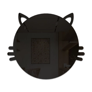 Creative cat-shaped acrylic mirror wall sticker reflecting a cozy indoor home decor scene