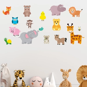 Detailed view of colorful cartoon animal wall stickers in a cozy nursery bedroom setting