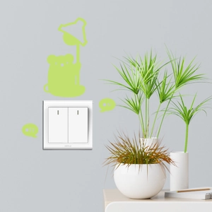 Glow-in-the-dark bear switch sticker with neon green ON and OFF labels for home decor