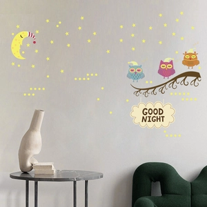 Luminous wall stickers featuring cartoon owls, moon and stars for kids' bedroom decor