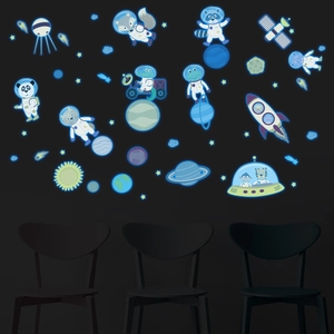 Luminous space wall stickers featuring cartoon animal astronauts and glowing planets set