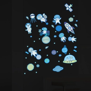Glow-in-the-dark space animal wall decals featuring glowing foxes and planets in dark room