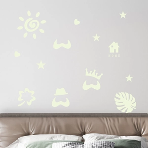Luminous wall stickers set with stars and sun designs for bedroom home decor