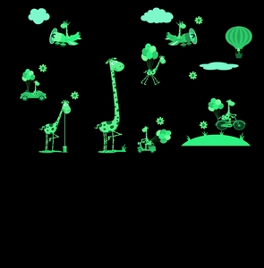 Detailed view of luminous giraffe wall stickers glowing in the dark for kids room decoration