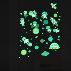 Glow in the dark space stickers for kids room featuring luminous astronaut animals and planets