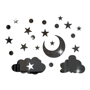 Macro view of mirror-finish acrylic moon and stars 3D wall stickers for home decor