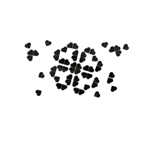 Detail view of 3D black acrylic heart-shaped wall stickers in a clover pattern layout