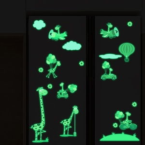 Luminous cartoon giraffe wall stickers glowing in the dark on refrigerator surface