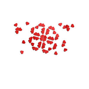 Detail of red heart-shaped mirror wall stickers with textured patterns on white surface