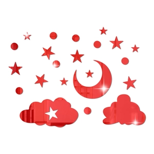 Macro detail of red mirror acrylic wall stickers set with moon stars and clouds