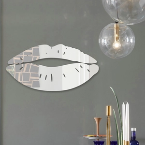 Detail view of red lips acrylic mirror wall sticker with geometric texture on grey wall
