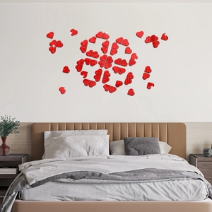 Red heart-shaped mirror wall stickers arranged in a clover pattern for home decor