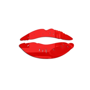 Detail of red acrylic mirror wall sticker in lip shape with high gloss surface